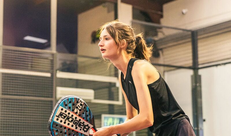 Professional padel coaching session